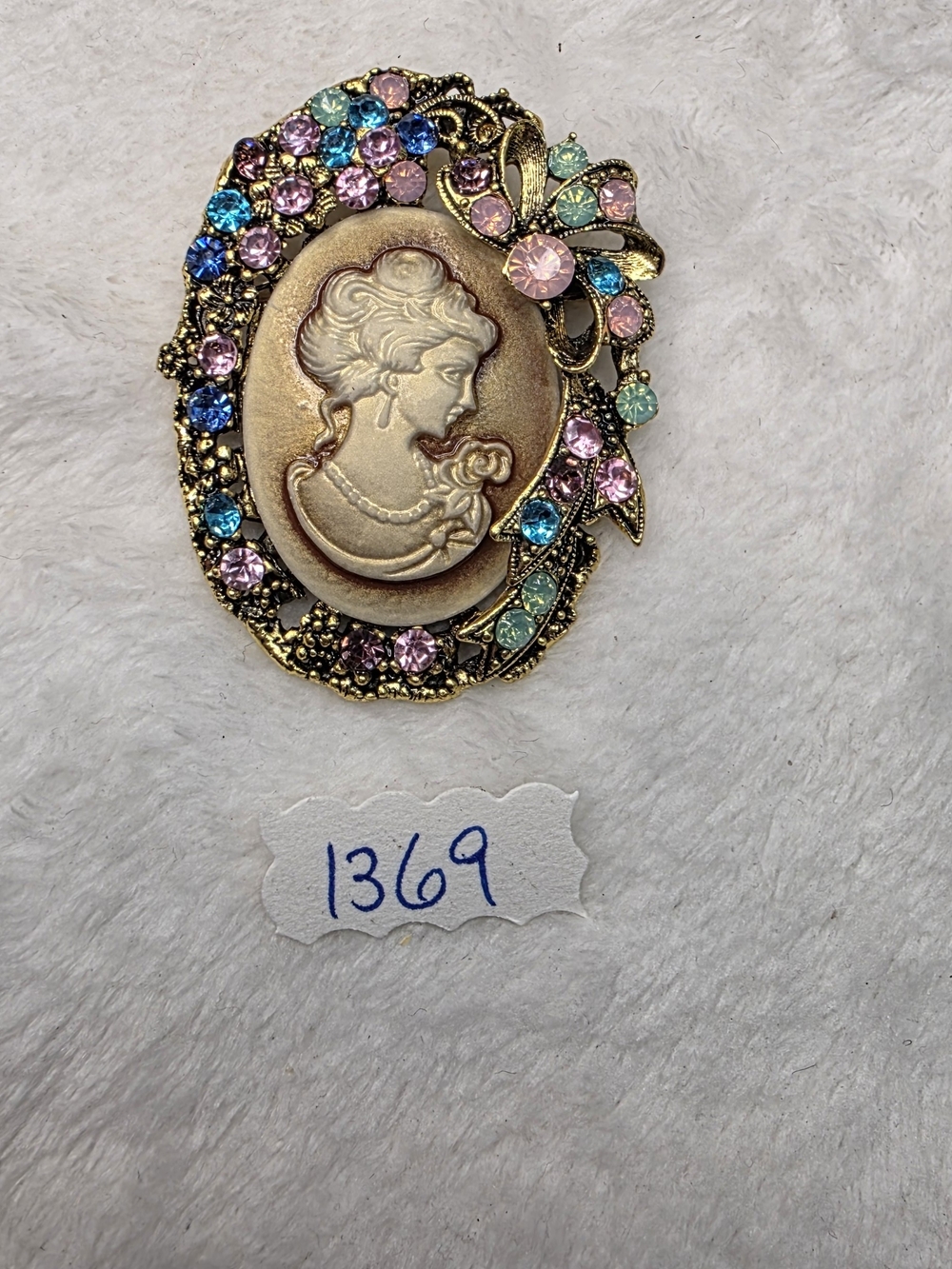 Vintage-Inspired Gold Cameo Brooch with Pastel Crystals